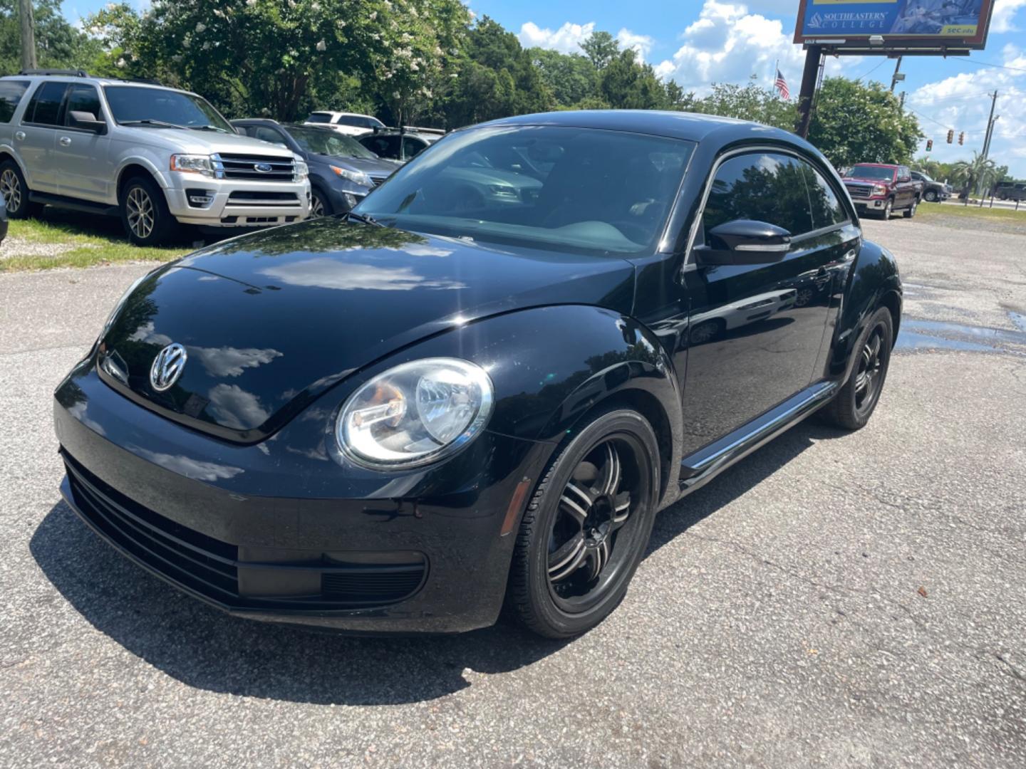 2012 BLACK VOLKSWAGEN BEETLE 2.5L PZEV (3VWJP7AT0CM) with an 2.5L engine, Automatic transmission, located at 5103 Dorchester Rd., Charleston, SC, 29418-5607, (843) 767-1122, 36.245171, -115.228050 - Local Trade-in with Leather, CD/AUX/Bluetooth, Hands-free Phone, Power Windows, Power Locks, Power Mirrors, All-weather Mats, Keyless Entry, Alloy Wheels. Clean CarFax (no accidents reported!) Only 68k miles! Located at New Life Auto Sales! 2023 WINNER for Post & Courier's Charleston's Choice Pre - Photo#2